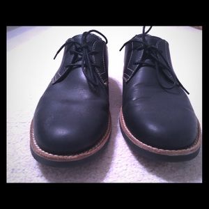 Men’s black penguin 10.5 shoes .